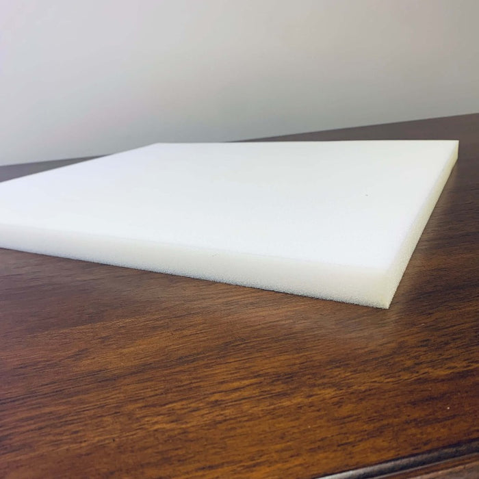 High density foam pad for shaker tape chair weaving on HH Perkins' table.