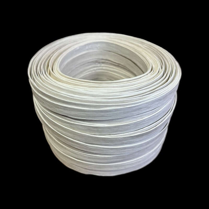 A rolled coil of white fiber splint.