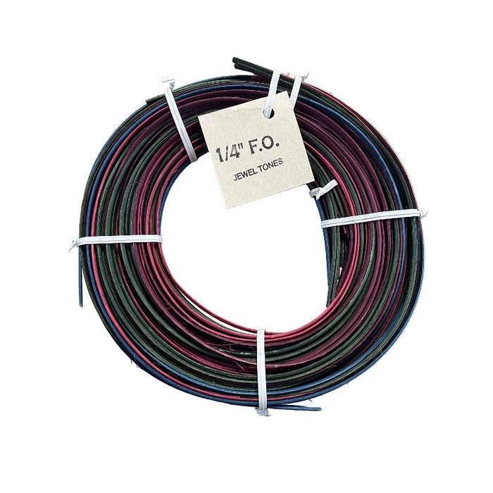 1/4 Inch Flat Oval Dyed Reed with tag reading 1/4" FO Jewel Tones on a white background