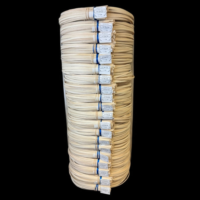 1/4" Flat Oval Reed Bundle of 25 coils stacked on top of one another with HH Perkins product tag and label.