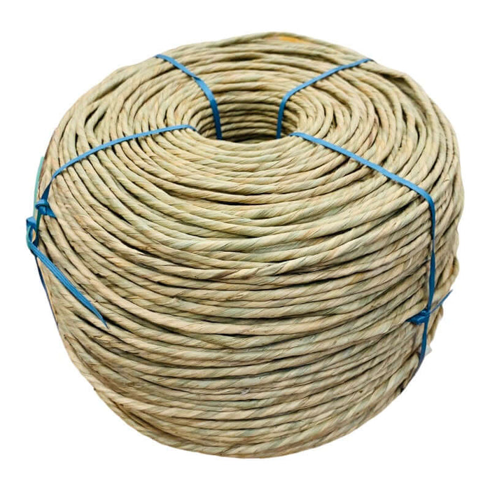 Ten pound coil of pre twisted natural rush on white background.
