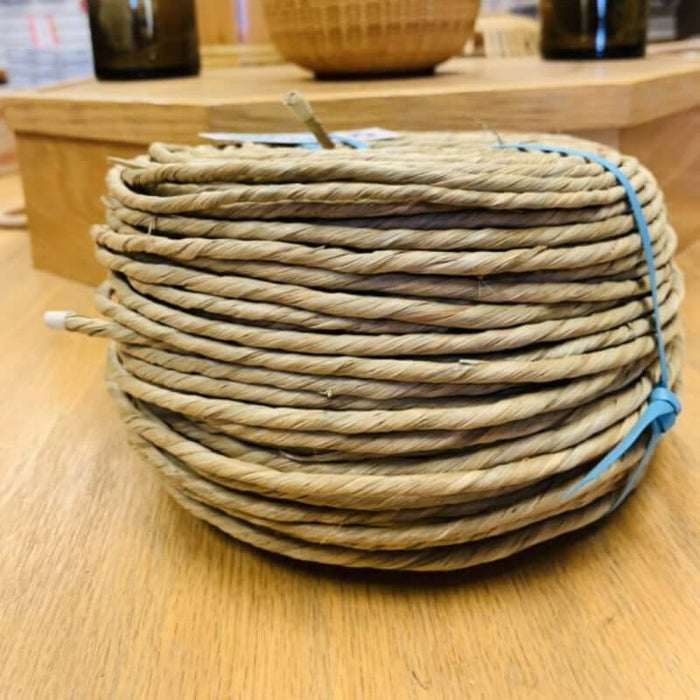 Two pound coil of pre twisted natural rush on table in the HH Perkins classroom.