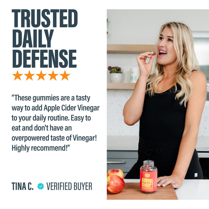 Woman enjoying BUBS Apple Cider Vinegar Gummies