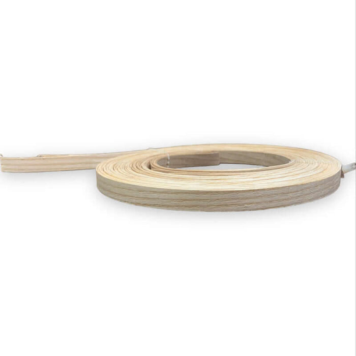 Rolled strips of half inch ash splint from HH Perkins in a coil.