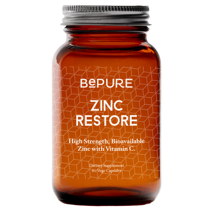 Orange supplement bottle labeled 'Bepure Zinc Restore' on a white background