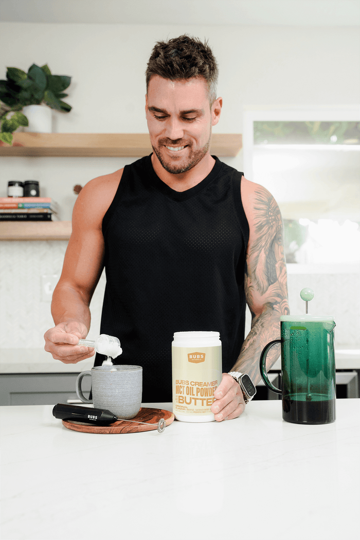 Man preparing BUBS Butter MCT Oil Creamer