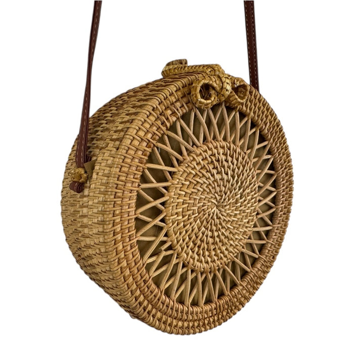 Artisan rattan canteen handbag, hand woven with unique designs, perfect for all seasons, featuring strong clasps and straps.