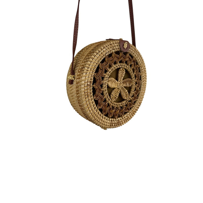 Artisan hand woven rattan canteen handbag with unique design and leather strap, perfect for all seasons.