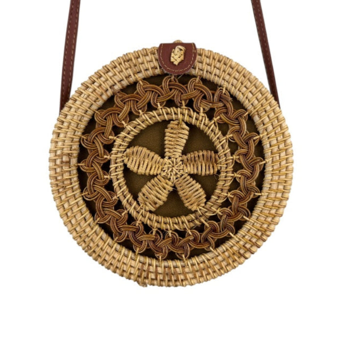 Artisan handwoven rattan canteen handbag with unique design and strong straps, perfect for all seasons.
