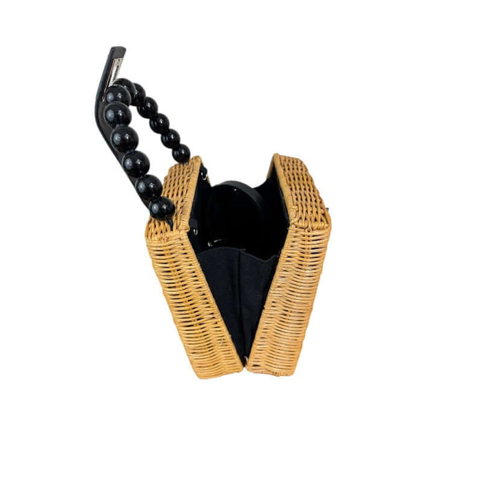 Mini wicker handbag with beaded purse handle and chrome clasp opened to show the width and interior.
