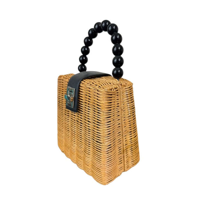 Mini wicker handbag with beaded purse handle and chrome clasp.