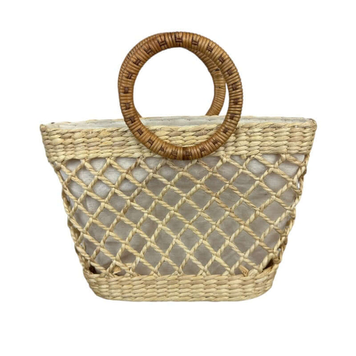 Straw tote bag with circular rattan handles.