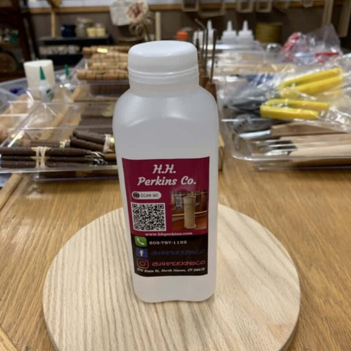 A bottle of HH Perkins' Glycerin resting on a basket base in the showroom.