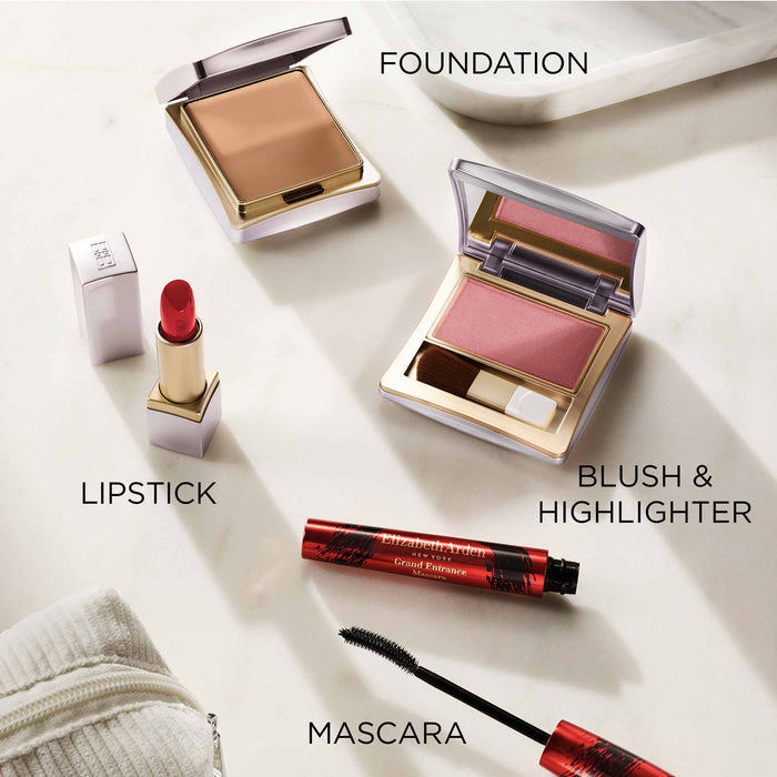 Makeup products including lipstick, blush, mascara, and foundation on a light background.