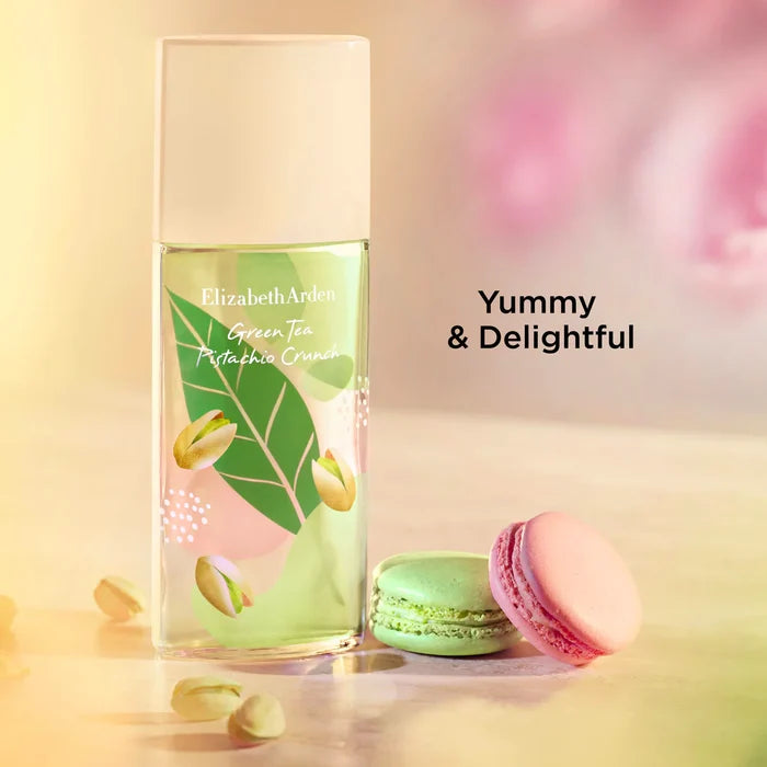 Elizabeth Arden perfume bottle with macarons on a soft background