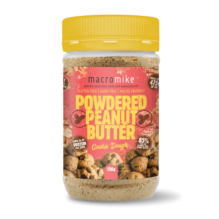 Jar of Macro Mike Powdered Peanut Butter with a yellow lid on a white background