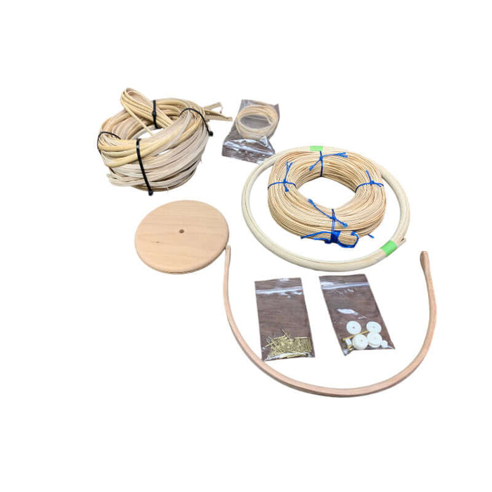 Nantucket Basket Replacement Kit includes 5mm Binder Cane Staves, Nantucket Cherry Base, pins, washers, Cherry Rim, strand cane, Binder Cane, Rattan Rim, and Cherry handle.