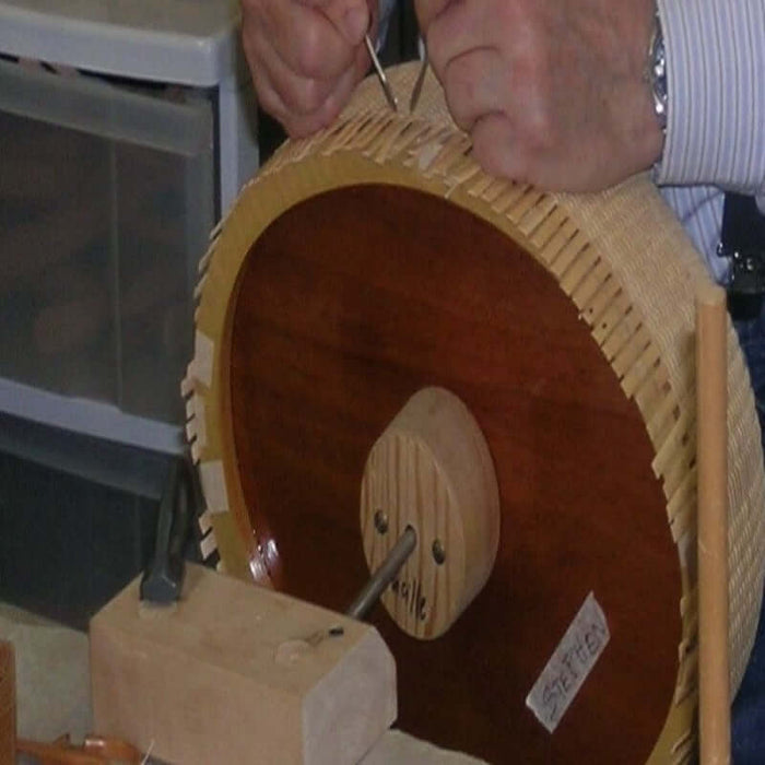 Nantucket Basket Weaver using Mold stand adapter to fasten large Nantucket Basket.