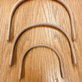 3 Round Nantucket Basket Cherry handles to show the variation in size.