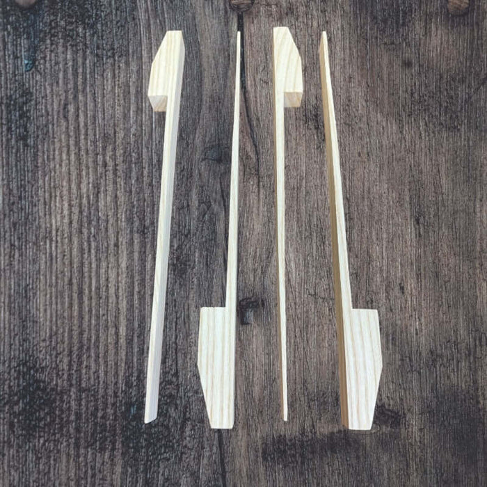 Large Oak basket feet laid out next to each other.