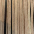 Oak Staves from HH Perkins lined up next to each other on brown table.