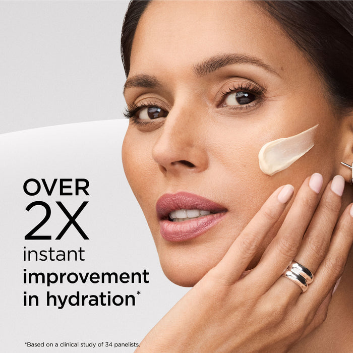 Woman applying cream to her face with text about hydration improvement.