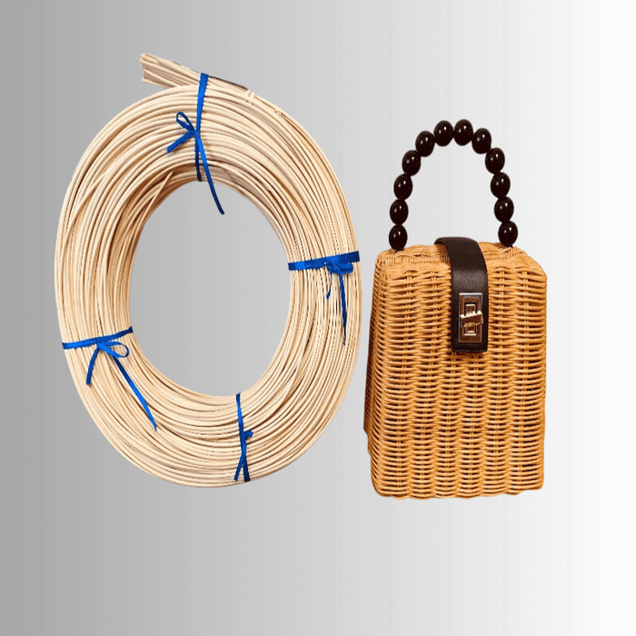 A 1 lb coil of HH Perkins Round Reed next to a handmade Baja Wicker purse.