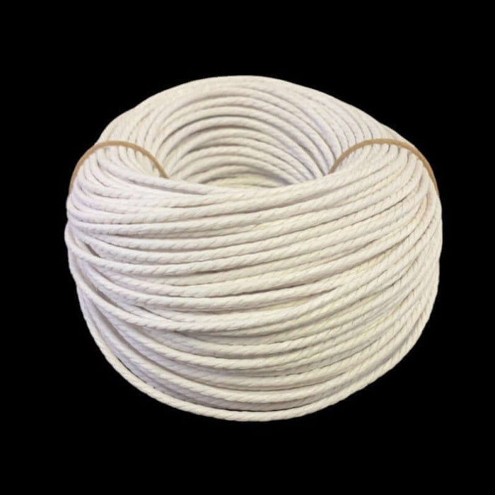 2 pound coil of White Unlaced Danish Cord on black background.