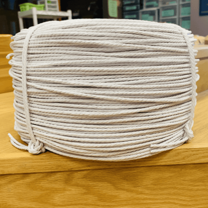 White Danish Cord 10 pound reel from HH Perkins for weaving chair seats and crafts.