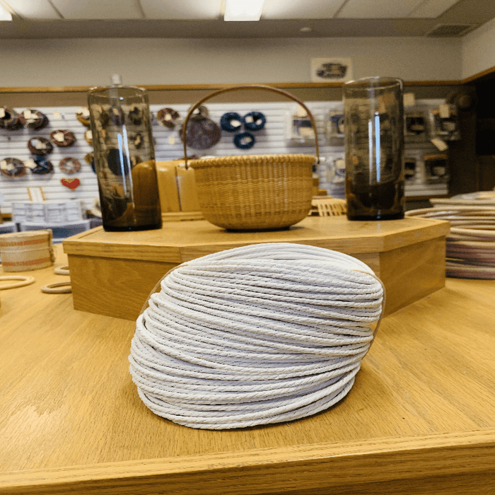 White Unlaced Danish Cord from HH Perkins on table in the HH Perkins' product showroom.